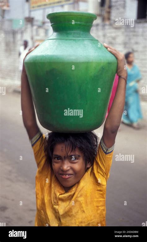 A Indian Girl With Fresh Water In The City Of Chennai In Province Tamil