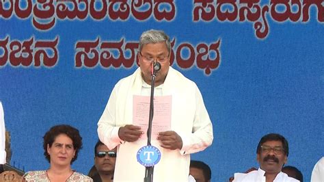 CM Siddaramaiah DCM DK Shivakumar Swearing In Ceremony Photos And