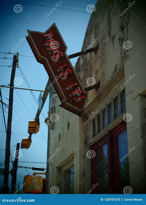 Vintage Neon this is it Arrow Sign Stock Image - Image of america ...