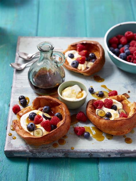 Dutch pancakes with fresh berries and yogurt and maple syrup ...