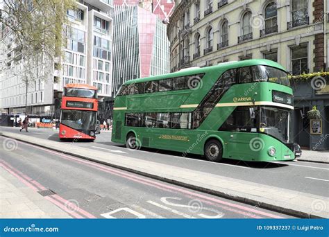 Green and Red Double-decker Buses in London,UK. Editorial Photography - Image of visitors ...