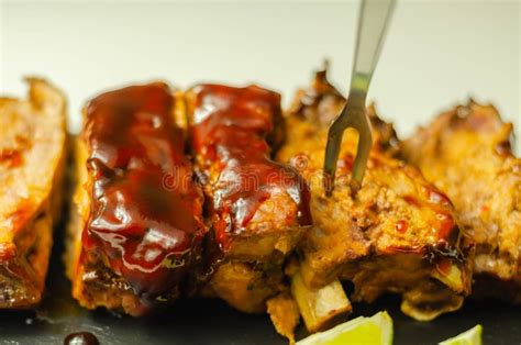 Pork Ribs In A Smoky Flavour Barbecue Seasoning With A Honey Barbecue Sauce Stock Image Image