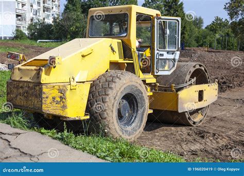 Bulldozer At A Construction Site Building A House Stock Image Image