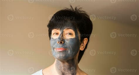 Beautiful Woman With Facial Mask Cosmetology Spa Skin Care And