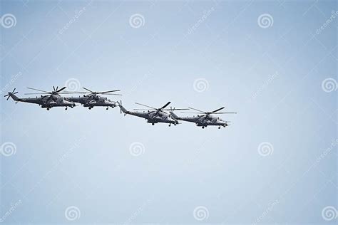 Fighters Flying Helicopters At The Victory Day Military Parade Stock