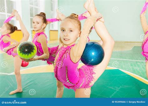 Girl Doing Rhythmic Gymnastics Elements With Ball Stock Photo Image