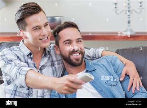 Gay Couple Watching Television Hi Res Stock Photography And Images Alamy