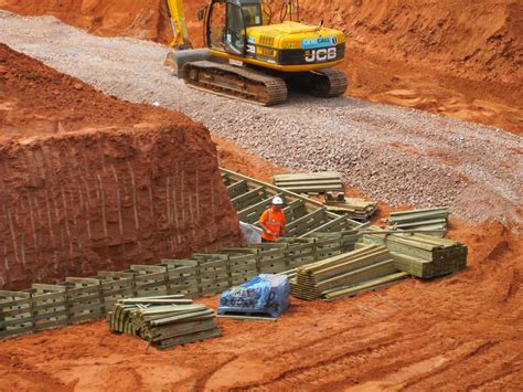 ESTRUCTURA DE MURO DE CONTENCIÓN DE PIEDRA Y MADERA – Geotecnia y Mecanica de Suelos