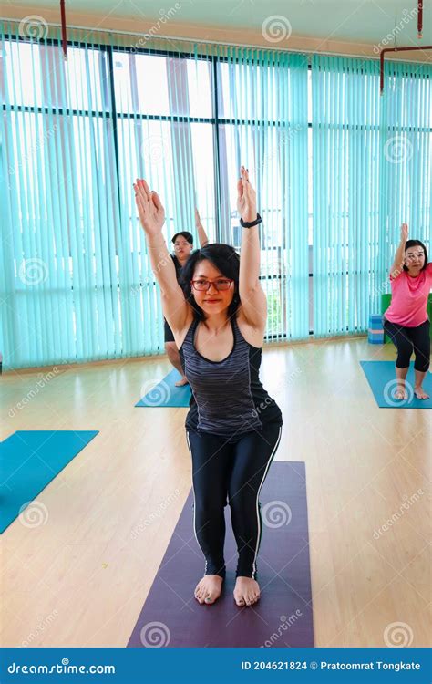 Yoga Practice Exercise Class Group Of Sporty People Practicing Yoga