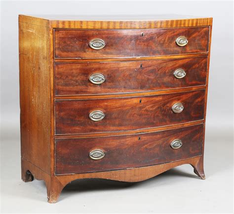 A Late George Iii Mahogany Bowfront Chest Of Oak Lined Drawers On