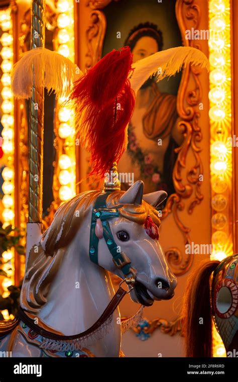 Closeup Of A Wooden Carousel Horse With Feathers Stock Photo Alamy