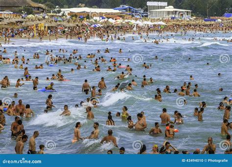 Crowded Beach And People In The Sea Waves Editorial Image Image Of