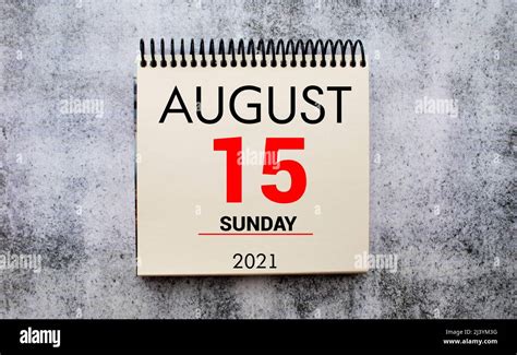 Save the Date written on a calendar - August 15 Stock Photo - Alamy