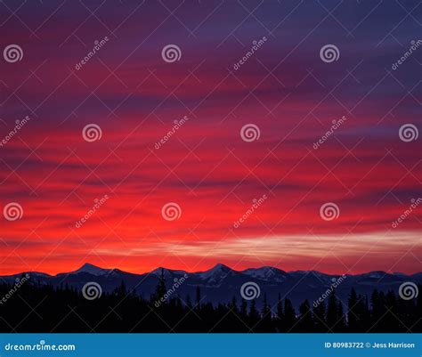 Bright Sunrise Over Snow Covered Canadian Mountains Stock Photo Image