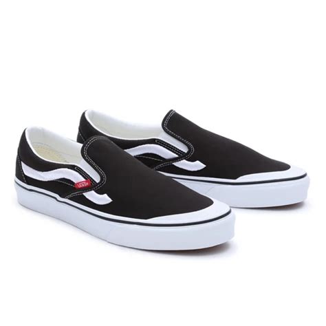 Zapatillas Classic Slip On 138 Sidestripe Negro Vans