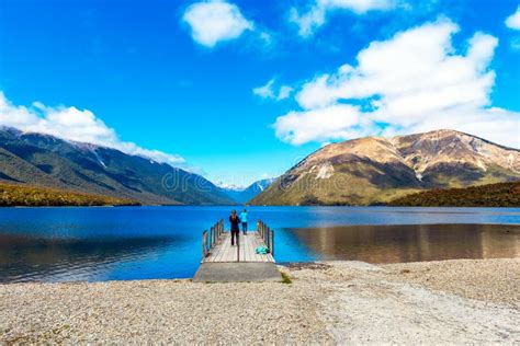 Girls On Pier River Rotoiti Nelson Lakes National Park New Zealand