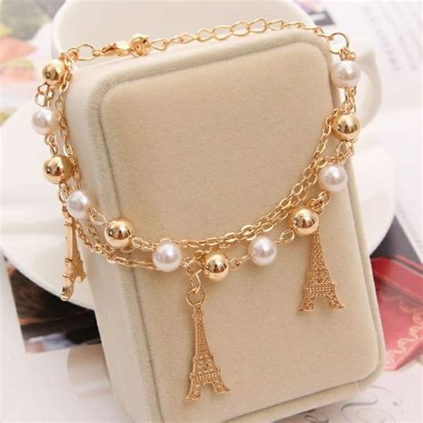 Pearl charm bracelet | Bangle bracelets with charms, Gold chain jewelry ...