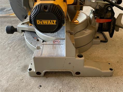 Lot 196R DeWalt Compound Miter Saw DW703 EstateSales Org