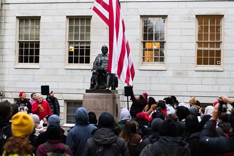 Protesters Watch as American Flag above John Harvard Statue is Taken Down | News | The Harvard ...