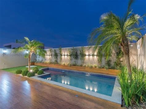 Modern Backyard Pool Design With Palm Trees