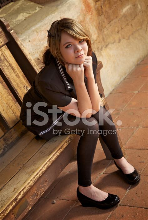 Girl Sitting On A Bench Stock Photo | Royalty-Free | FreeImages