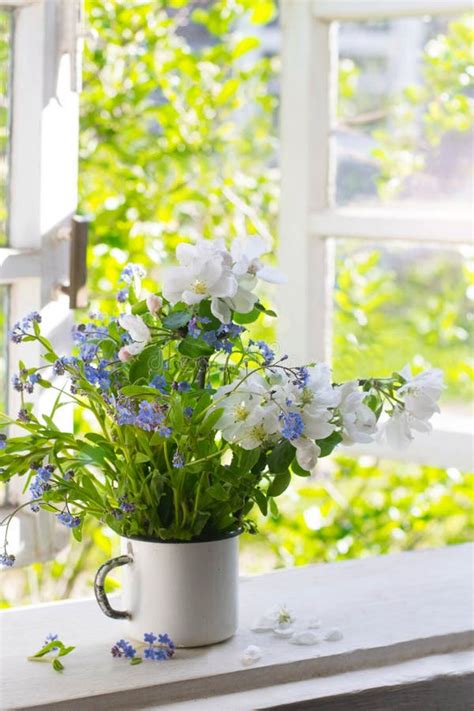 Bouquet of spring flowers stock image. Image of sill - 216268259