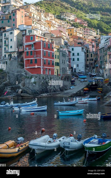 Boats Line Up Front Of The Colorful Riomaggiore Village Cinque Terre