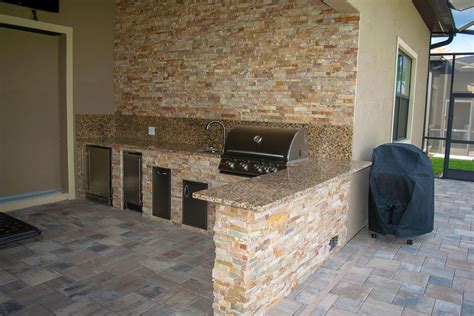 Stacked Stone And Granite Paradise Kitchen Elegant Outdoor Kitchens