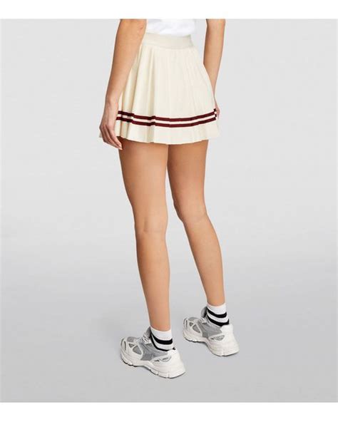 Sporty Rich Logo Pleated Mini Skirt In Natural Lyst