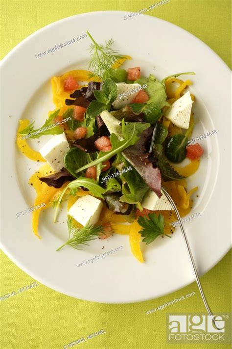 Mixed Leaf Salad With Pepper Rocket Feta Cheese And Tomatoes Stock