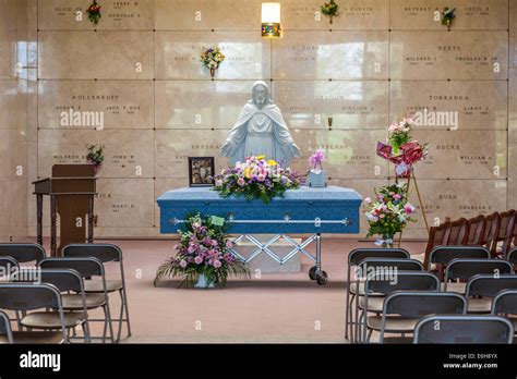 Casket Prepared For Funeral Service Inside Mausoleum At Cemetery Stock