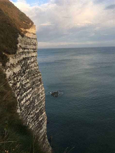 See the White Chalk Cliffs and Arches at Étretat Normandy Coast ...