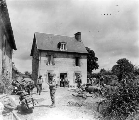 American Troops Relax In A Farm Courtyard Wwii Normandy Battle Of