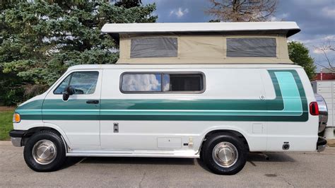 1996 Dodge Ram Pop-Top Camper Van Is Clean And Green With Kitchen, Bathroom