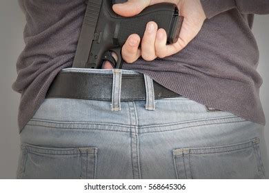 Man Gun Behind His Back Images Stock Photos Vectors Shutterstock