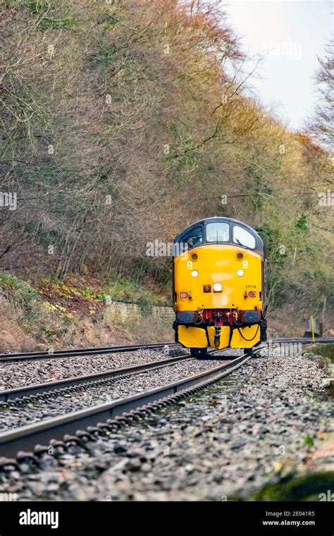 English Electric Type 3 British Rail Class 37 Diesel Locomotive Number 37716 Running On Railway