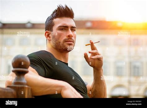 Handsome Man Smoking Cigarette Hi Res Stock Photography And Images Alamy