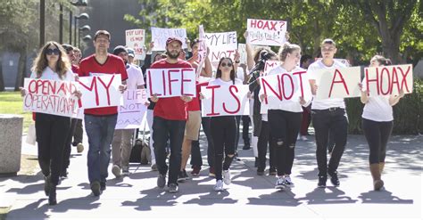 student demonstration denounces campus polices reaction  gun threat