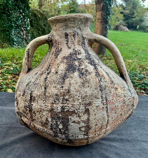 Proantic: Grand tonnelet terre vernissée pastillages Saintonge XVe s