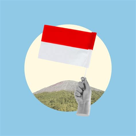 premium photo human hand holding  indonesia flag