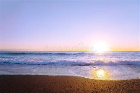 Beautiful Panoramic Seascape With Waves And Golden Sunset Reflection