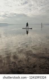 Man Paddeling On Lake Images Stock Photos D Objects Vectors