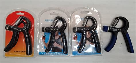 Lot - Four hand grip exercise aids