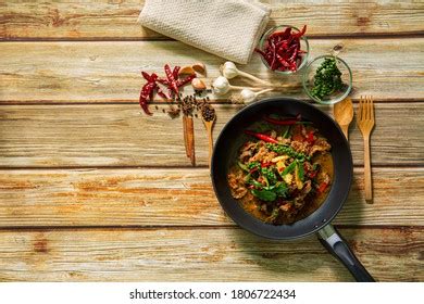 Spicy Stir Fried Chop Pork With Chili And Basil Leaf On Bowl Over 52