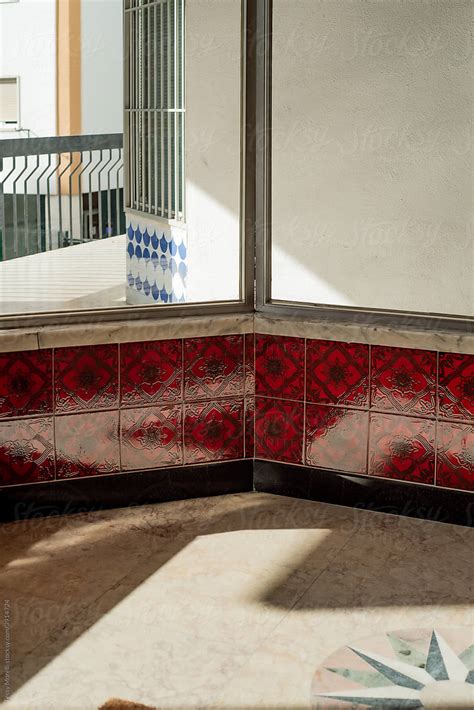 Hallway Of A Residential Building With Tiles By Stocksy Contributor