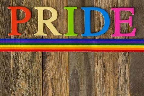 Premium Photo Rainbow Gay Pride Sign On A Wood Background