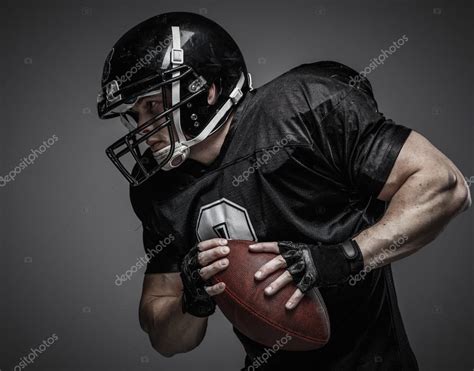 American Football Player With Ball Stock Photo By ©nejron 63291407