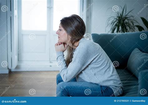 Young Sad Woman Suffering From Depression Feeling Desperate And Lonely