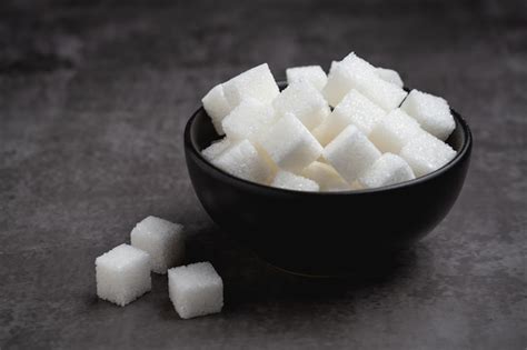 Free Photo White Sugar Cubes In Bowl On Table