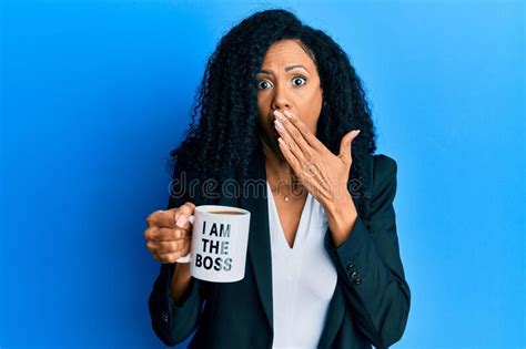 Middle Age African American Woman Drinking From I Am The Boss Coffee